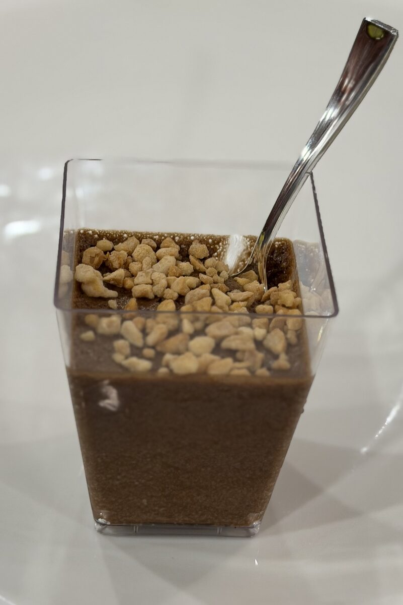 Viennese chocolate mousse cup topped with praline crunch